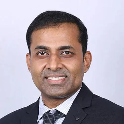 Dr. Vinod Thomas